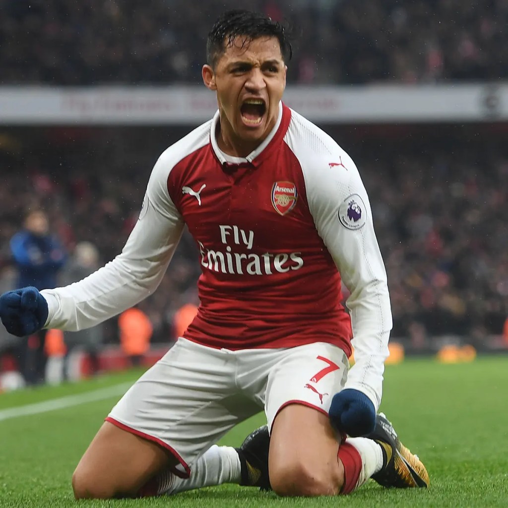 Alexis Sanchez. Footbal player on his knees