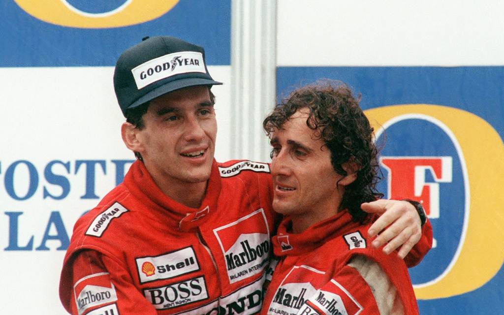Two racers hugging